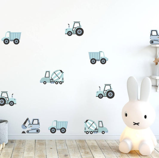 Set van 12 blauwe muurstickers met bouwvoertuigen, waaronder graafmachines, tractoren, kiepwagens en betonmixers, voor de kinderkamer.