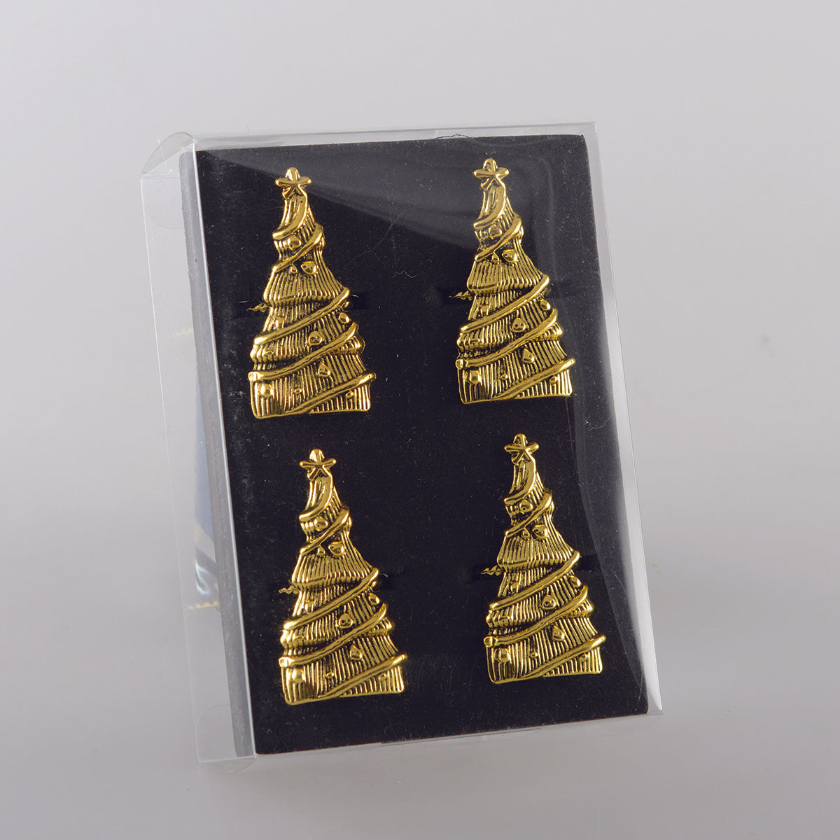 Set van 4 vergulde kerstboom servetringen voor een chique en feestelijke tafelsetting.