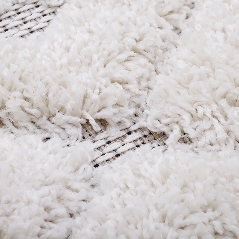 Hoogpolig Homy Bohemian vloerkleed in witte en beige tinten, perfect voor kinderkamers, slaapkamers en bohemian interieurs.
