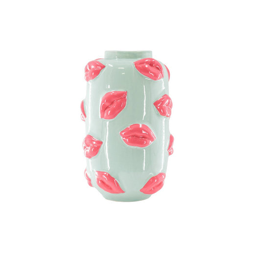 Mintgroene keramieken vaas met opvallende roze lippen van het merk Housevitamin op een witte achtergrond.
