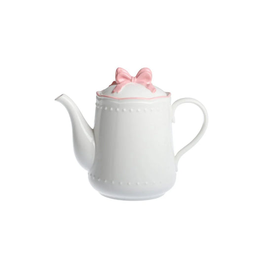 Vooraanzicht van de klassieke witte porseleinen theepot Ribbon Grace met roze lintdecoratie.