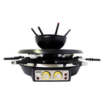 Vooraanzicht van de Zanussi 4-in-1 set met de roestvrijstalen fonduepan bovenop de grillplaat.